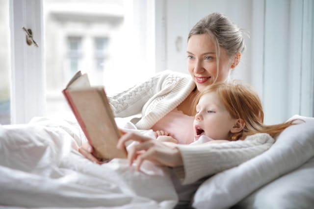 mother and daughter reading