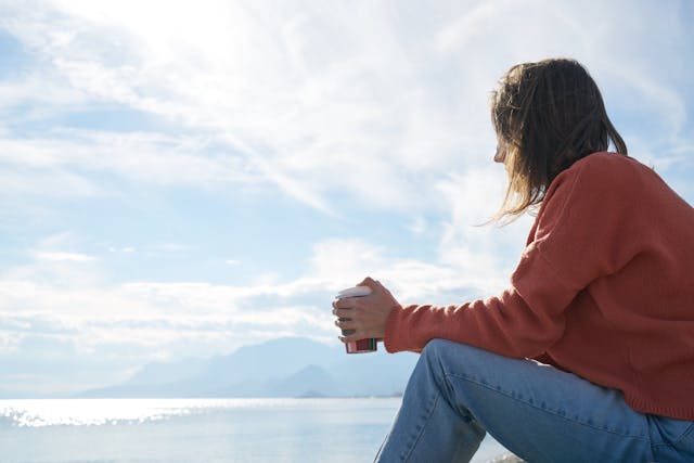 stressed woman sitting alone