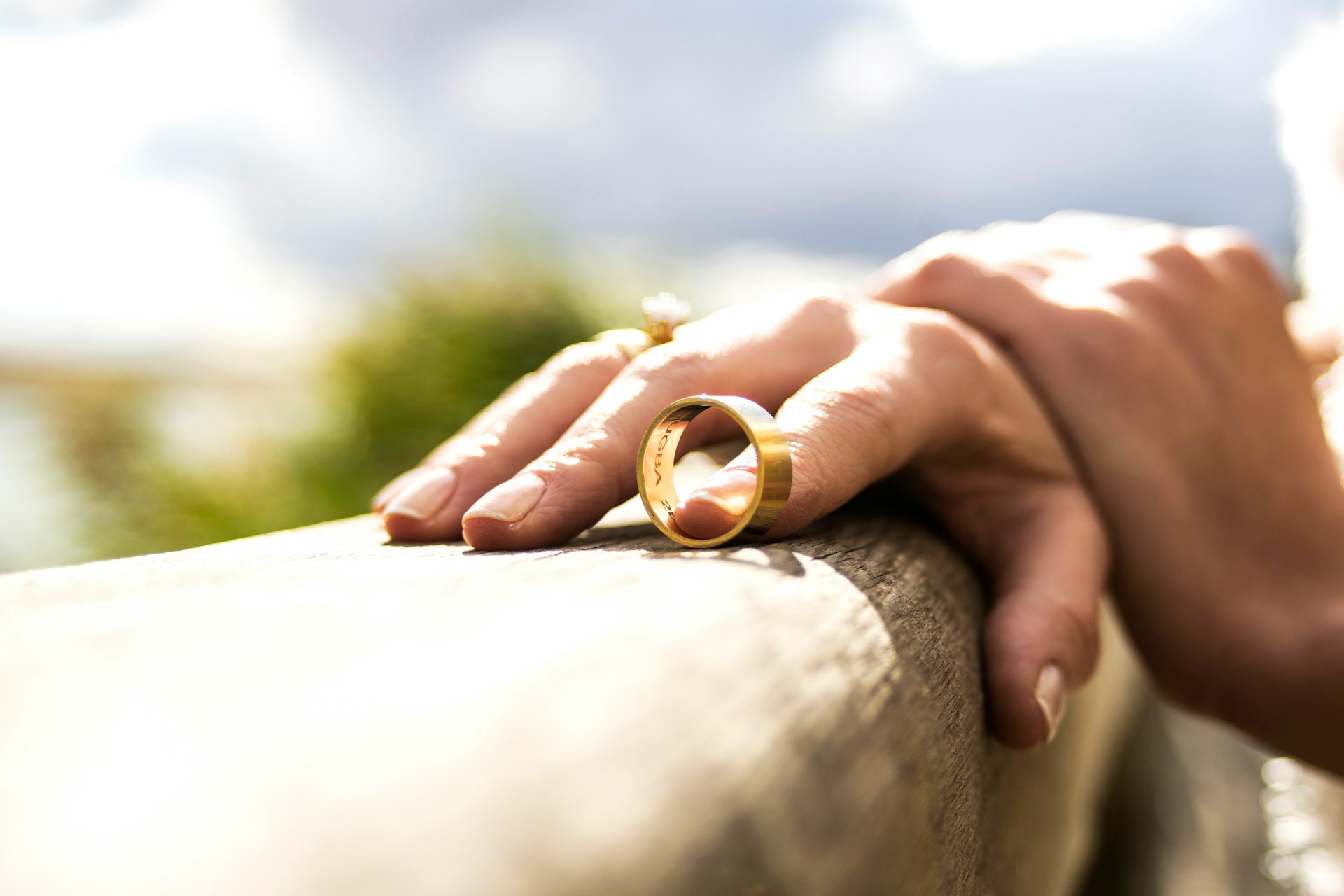 person holding wedding ring
